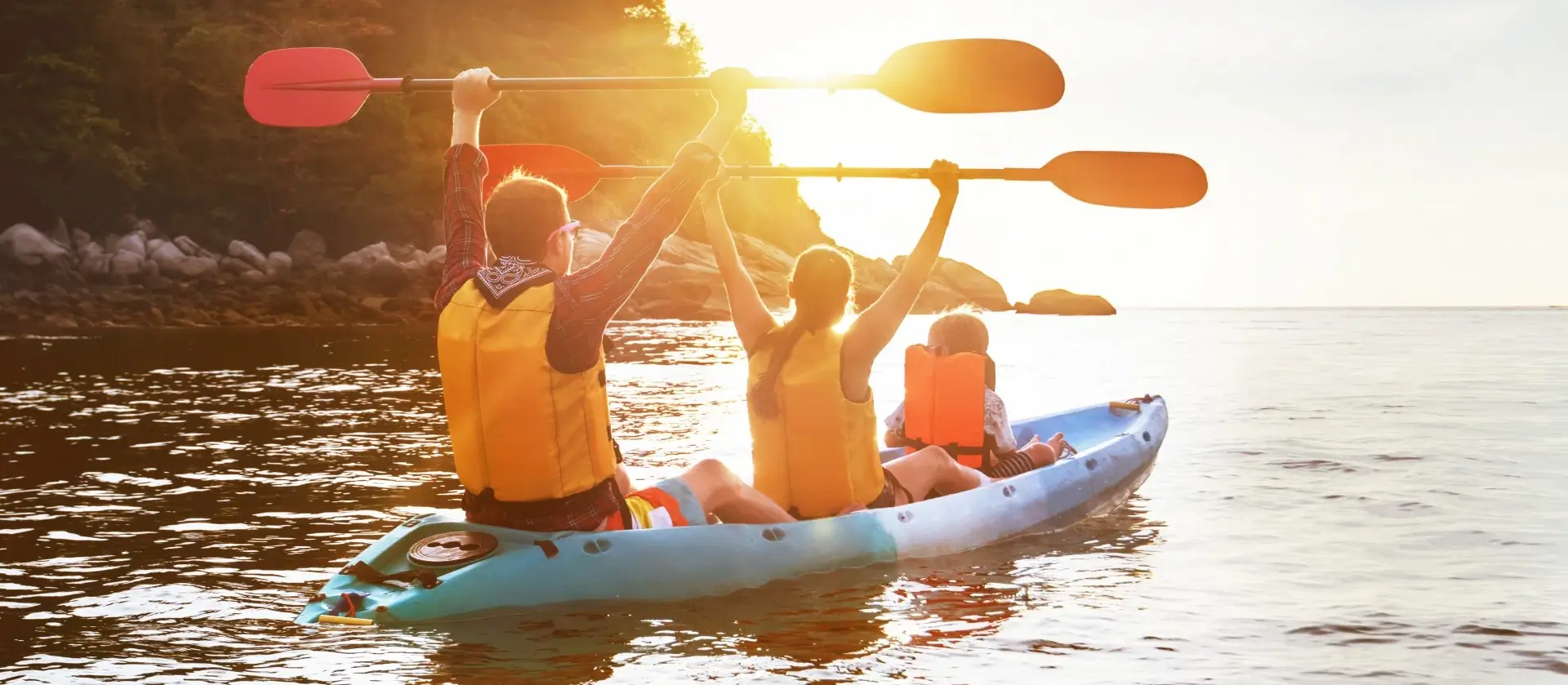 Family kayaking together